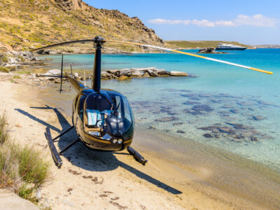 Small private helicopter on the beach of Paros island, Cyclades, Greece.